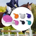 Colorful horse saddle pads displayed with rider jumping over a fence